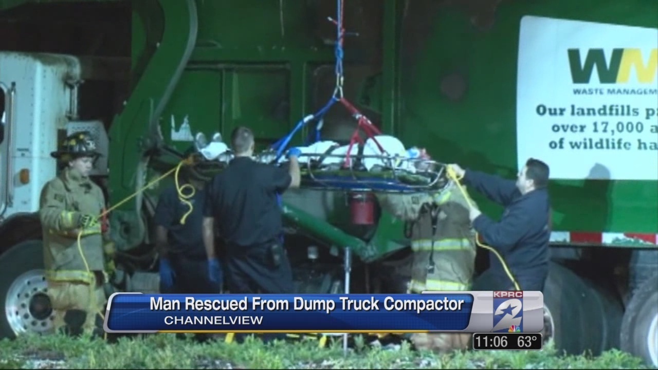 Man nearly crushed in dump truck trash compactor