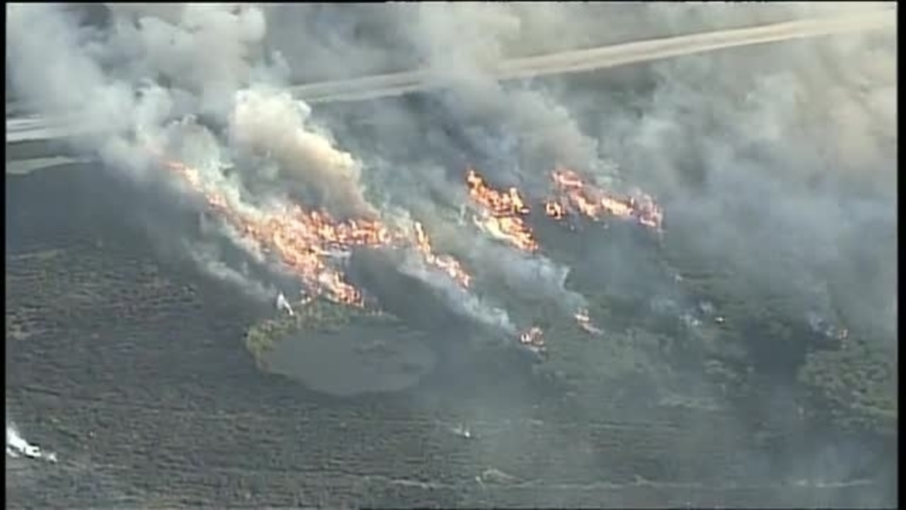 Huge grass fire burns in Galveston County