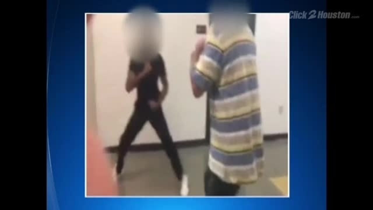 Caught on camera: Teacher, student fight in school hallway