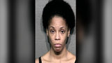 Houston woman charged with child abandonment after child was found in hot car